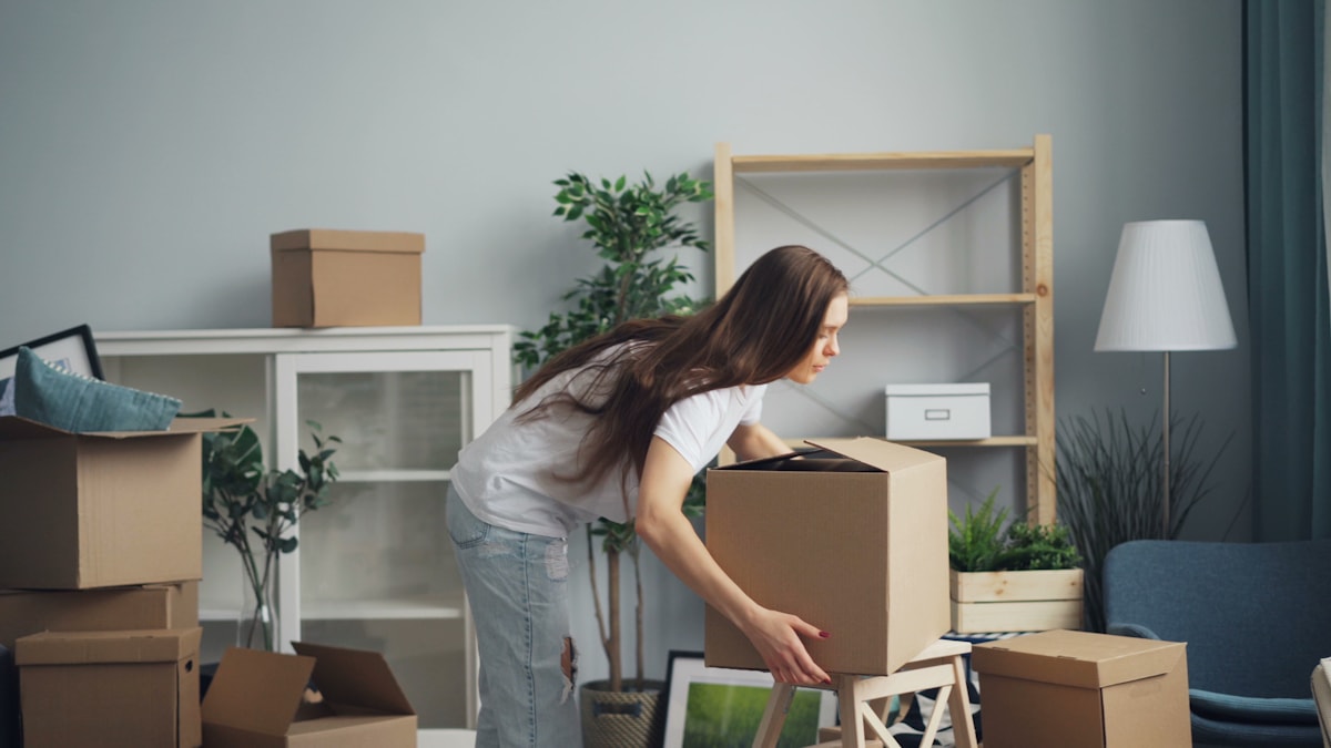 A resident settling into a new San Francisco home after a move by Franklin Moving Services